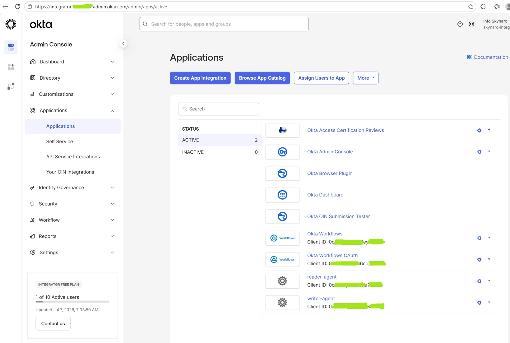 Okta Admin Console showing the reader-agent and writer-agent applications